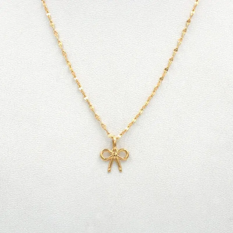 CON_LAZOCAFFE1 Conjunto Lazo de oro 18k con cadena y colgante delicado, joya femenina y elegante.